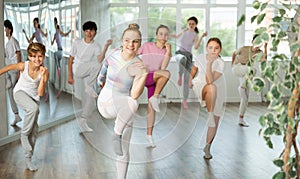 Group of boys and girls dancing dancehall