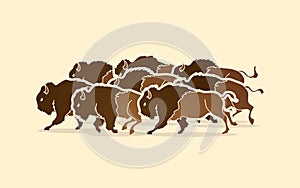 Group of buffalo running