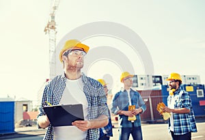 Group of builders in hardhats outdoors