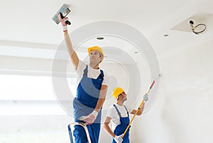 Group of builders with tools indoors