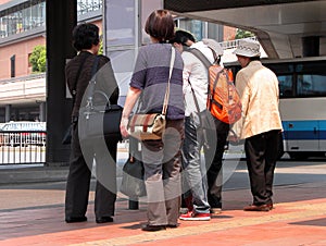 Group in the bus station