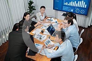 Group of business analyst team analyzing financial data report. Habiliment