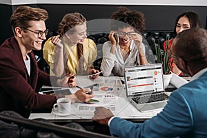 group of business partners having conversation