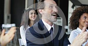 Group Of Business People Applauding At Conference Meeting, Seminar Listeners Greeting Speaker Clapping Hands In Office