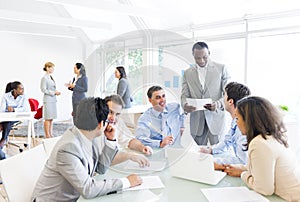 Group Of Business People Around The Conference Table