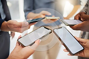 Group, business people and blank phone screen for mockup space, mobile app and multimedia networking. Closeup hands of