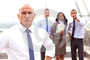 Group of business people with businessman leader