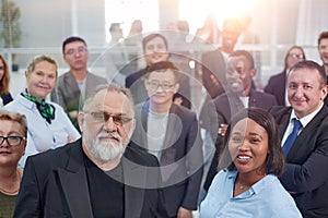 Group of business people with businessman leader on foreground