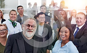 Group of business people with businessman leader on foreground