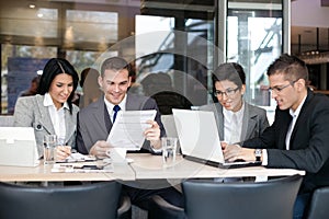 Group of business people in cafe