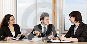 Group of business people discuss working schedule