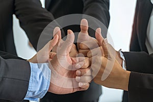 Group business people of hands making give thumbs up sign teamwork. Support together successful Concept