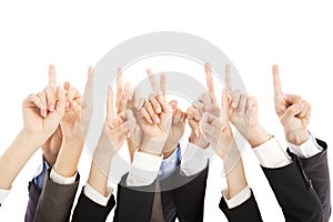 Group of business people hands point upward together