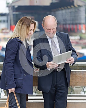 Group of business people having a chat about a presentation on t