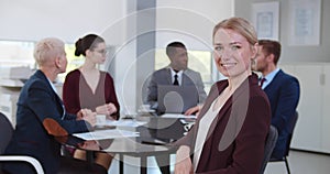 Group of business people having discussion in conference room