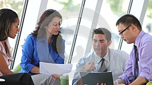 Group Of Business People Having Informal Meeting