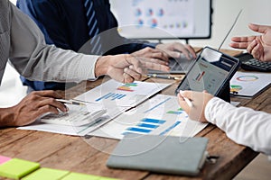 Group business people are having a meeting and planning their business together in the conference room, leaders of startup