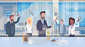 Group Of Business People Holding Magnifying Glass Working In Modern Office Concept Team Of Businessmen And Businesswomen