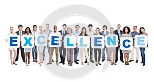 Group Of Business People Holding The Word Excellence