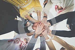 Group of business people joining hands. Team work concept