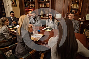 Group of business people or lawyers - meeting in an office