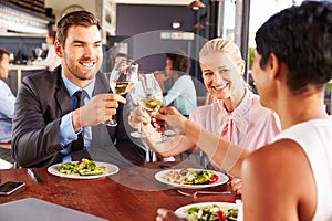 Group of business people at lunch in a restaurant