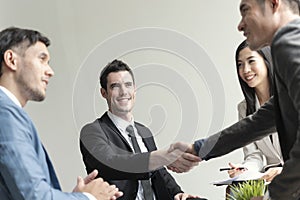 Group of business people making handshake agreement. concept partner to business