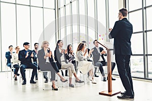 Group of business people meeting in a seminar conference