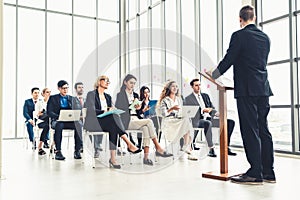 Group of business people meeting in a seminar conference