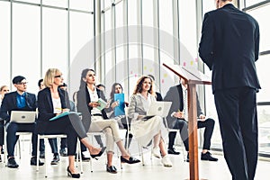 Group of business people meeting in a seminar conference