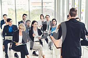 Group of business people meeting in a seminar conference