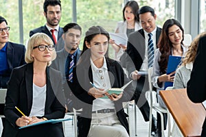 Group of business people meeting in a seminar conference