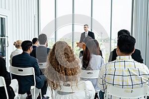 Group of business people meeting in a seminar conference