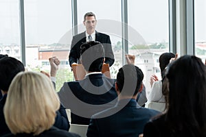 Group of business people meeting in a seminar conference