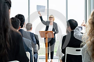 Group of business people meeting in a seminar conference