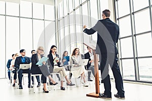 Group of business people meeting in a seminar conference