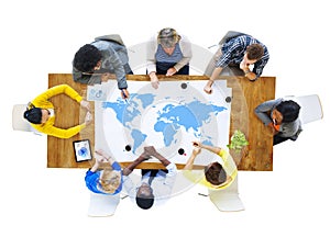 Group of Business People Meeting with World Map