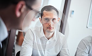 Group of business people in a modern office, working businessmen planning ideas generation and business plan. Businessmen are