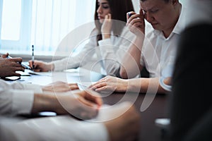 Group of business people in a modern office, working businessmen planning ideas generation and business plan. Businessmen are