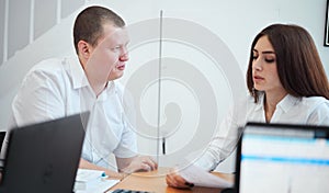 Group of business people in a modern office, working businessmen planning ideas generation and business plan. Businessmen are