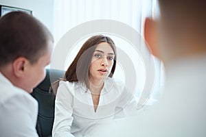 Group of business people in a modern office, working businessmen planning ideas generation and business plan. Businessmen are