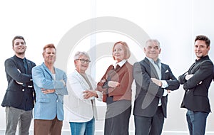 Group of business people in an office lined up