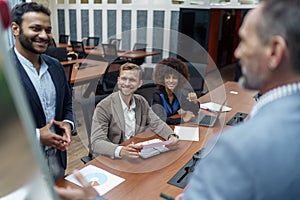 A group of business people partners during a set team meeting in the modern office