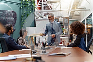 A group of business people partners during a set team meeting in the modern office