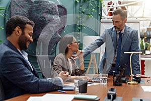 A group of business people partners during a set team meeting in the modern office