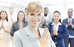 Group of business people paying respect