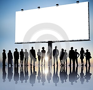 Group of Business People Reading Placard