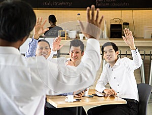 Group of business People say goodbye his friend in cafe