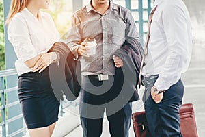 Group of Business people talking in outside office building after work