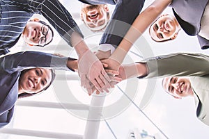 Group of business people with their hands holding together, banner of business teamwork.